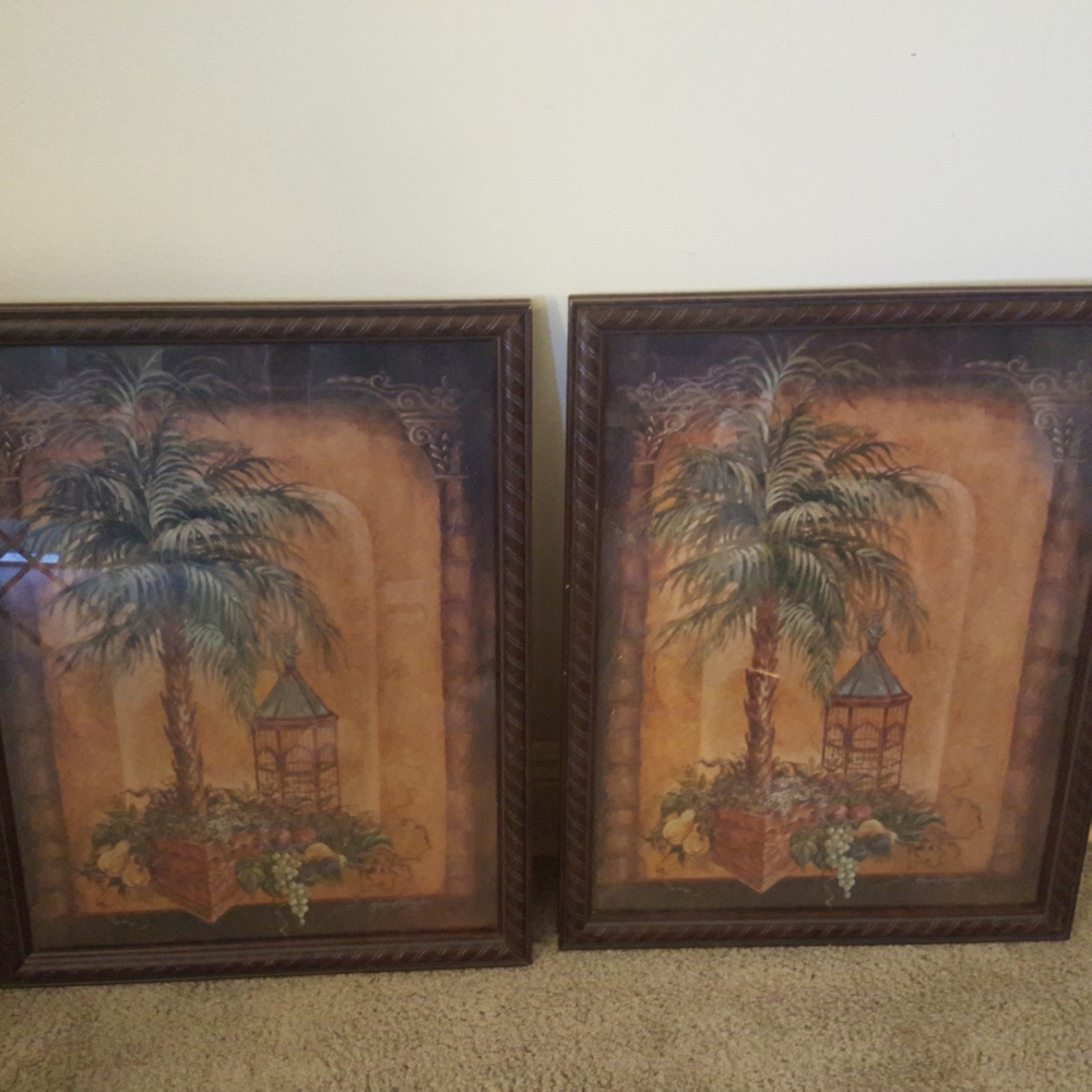 Home interior palm tree picture with bird cage